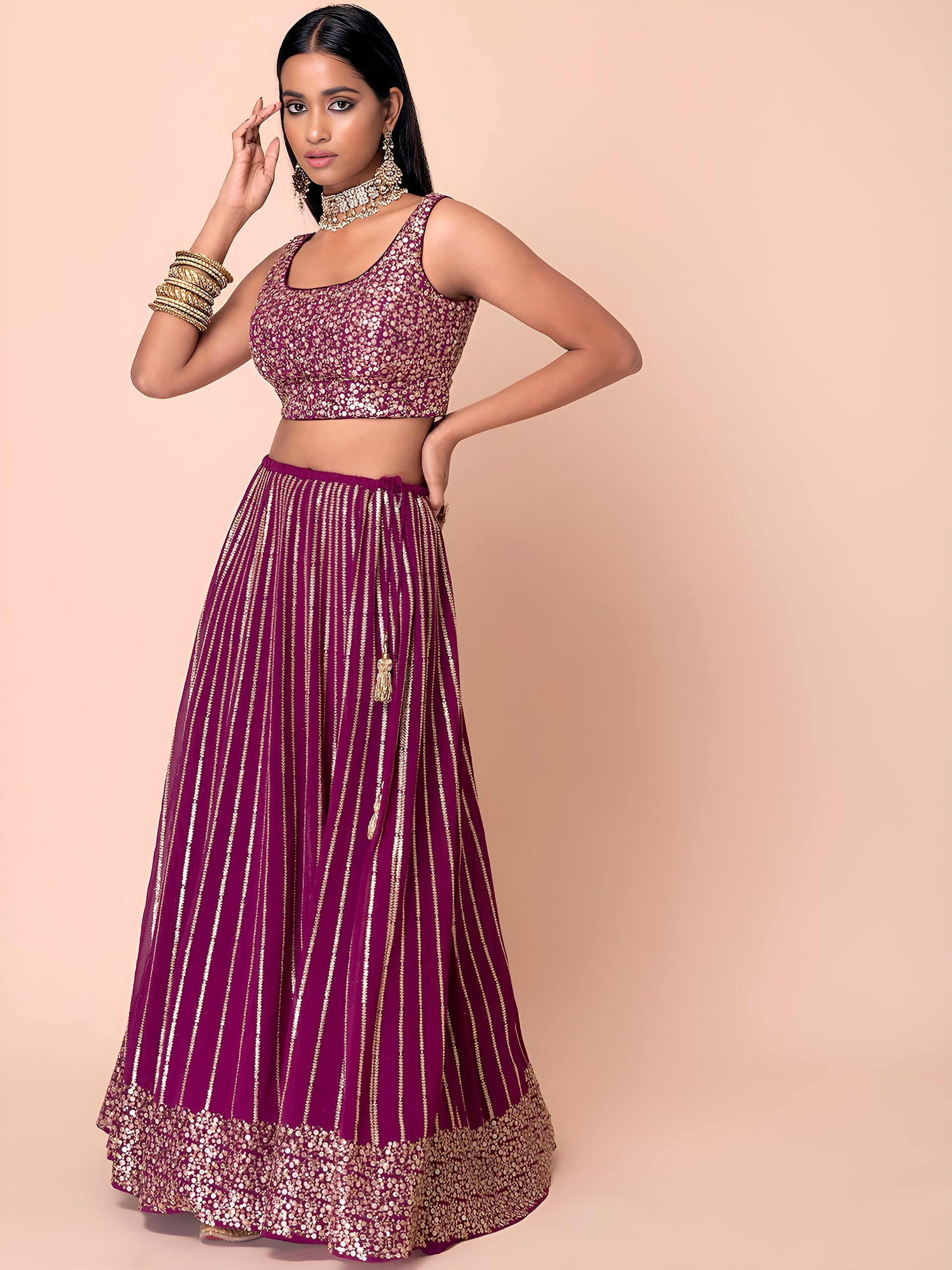 This outfit is a wine Georgette lehenga