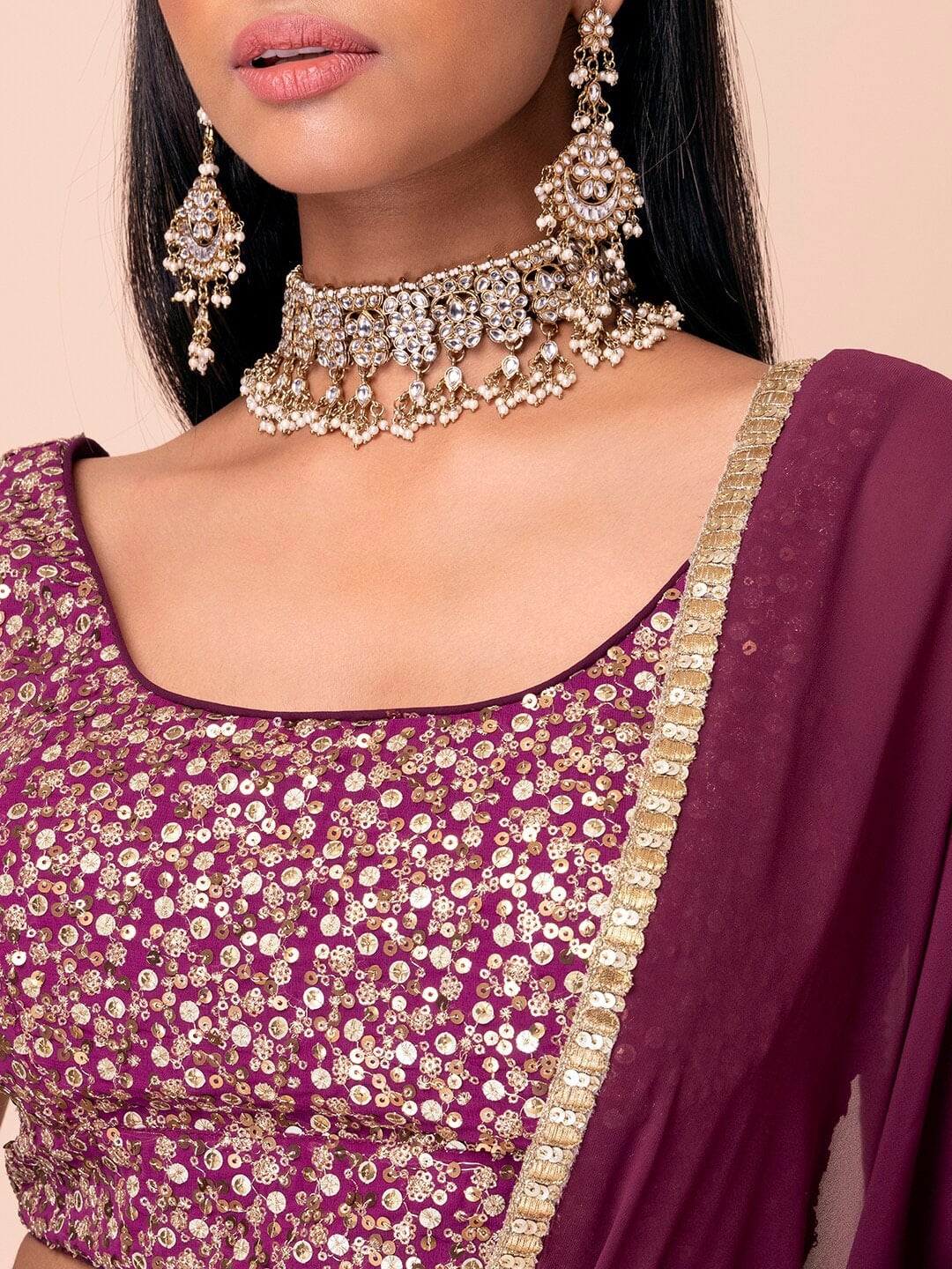 This outfit is a wine Georgette lehenga
