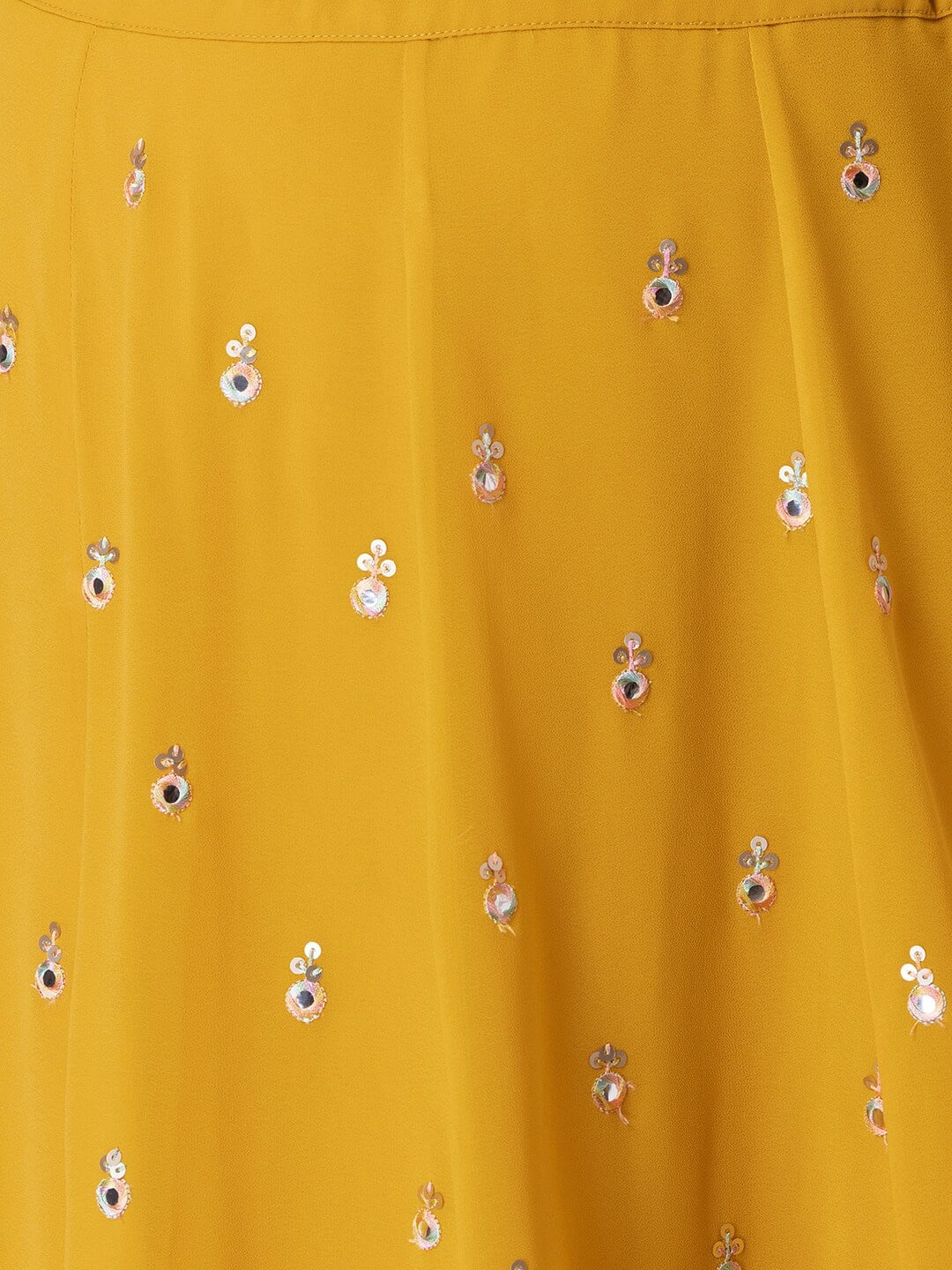 This outfit is a Black Georgette lehenga - Yellow