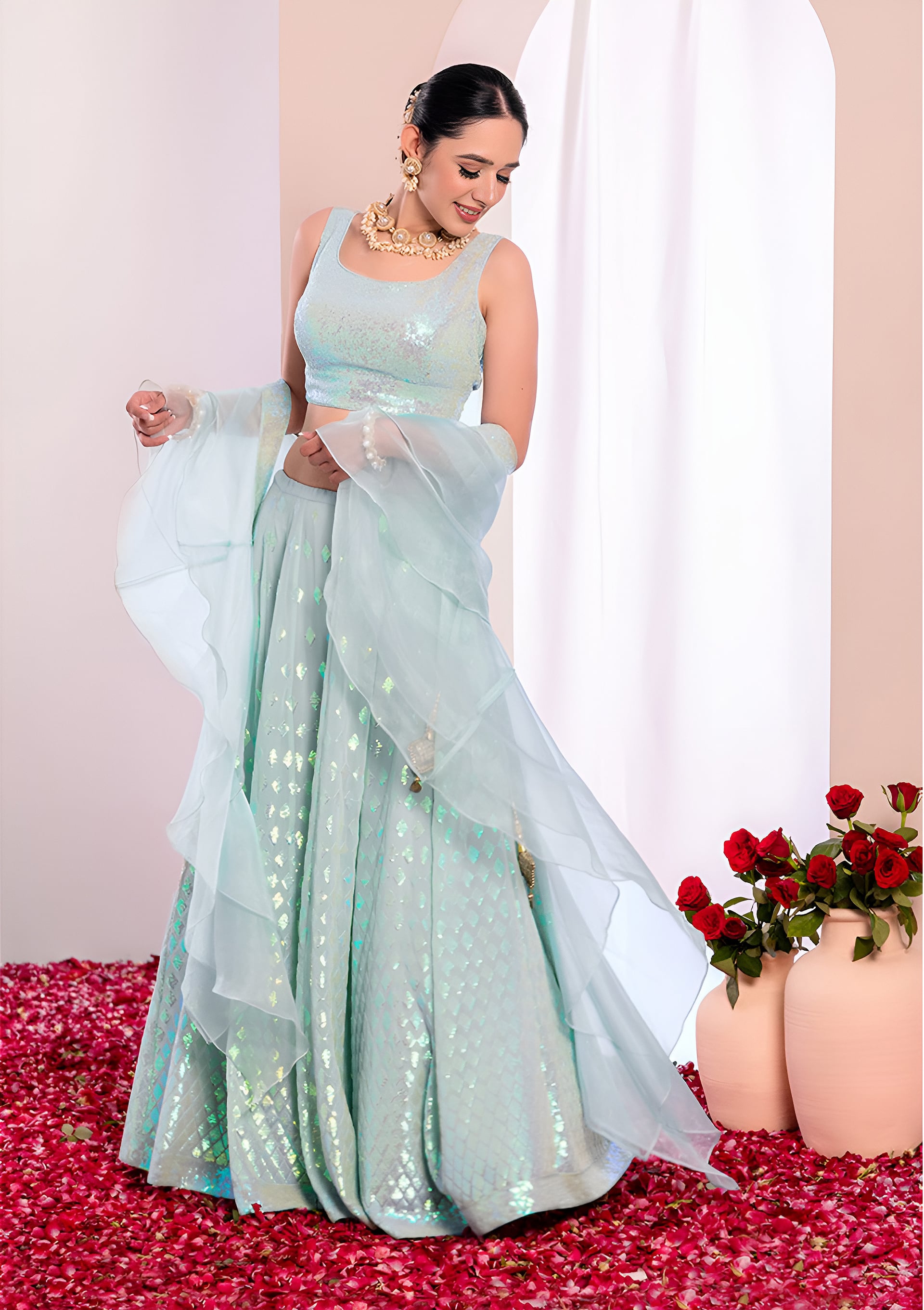 This outfit is a Black Georgette lehenga - Blue