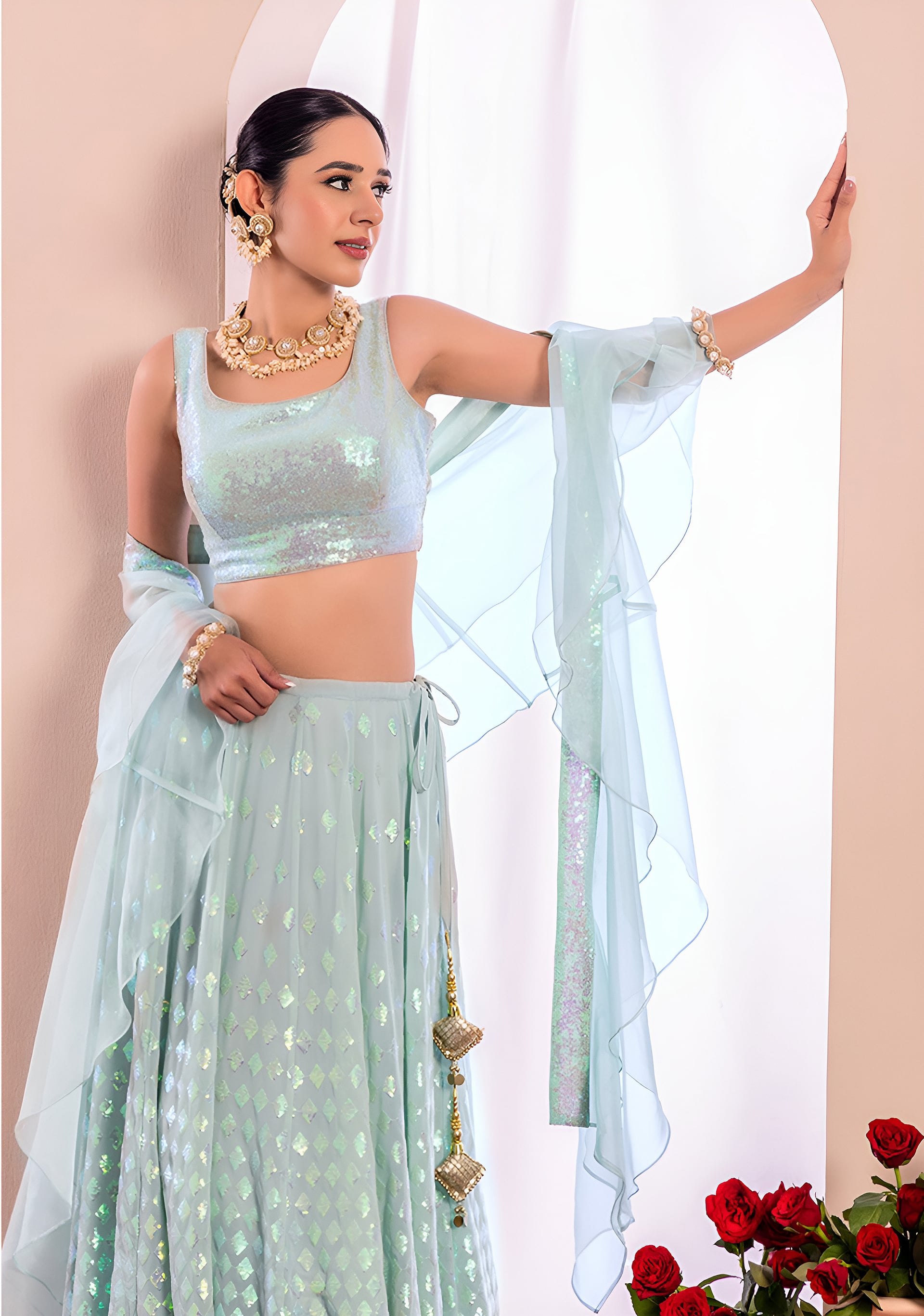 This outfit is a Black Georgette lehenga - Blue